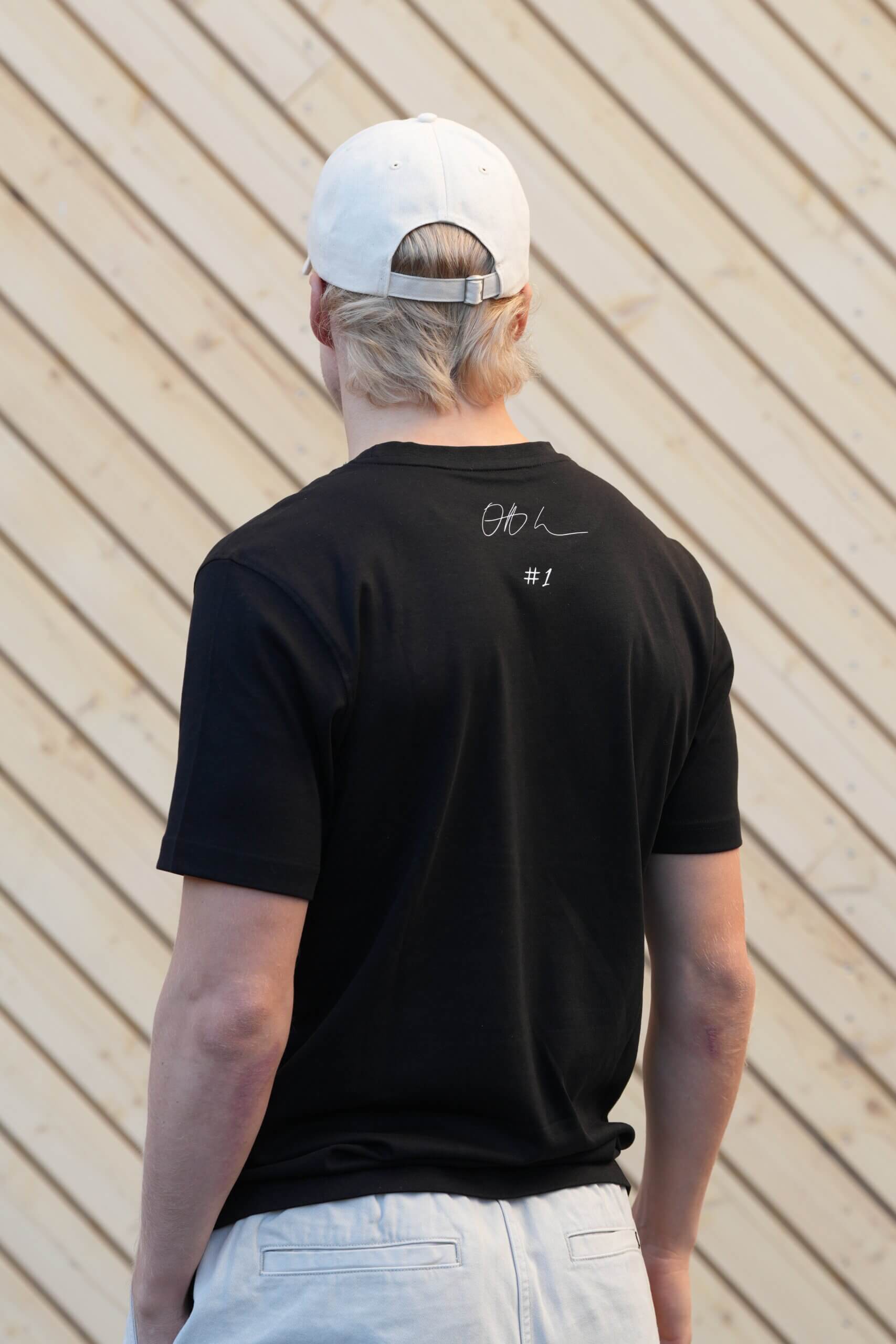 Aim For More First Edition Tee takaa